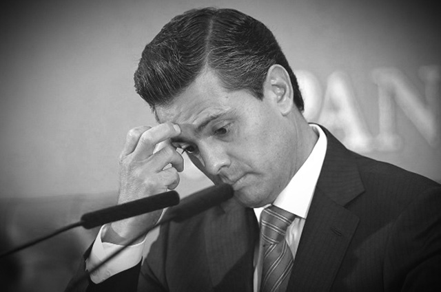 Mexico's President Enrique Pena Nieto considers the answer of a question during a press conference at the Japan National Press Club in Tokyo, Wednesday, April 10, 2013. Pena Nieto was in Japan on a four-day official visit. (AP Photo/Shizuo Kambayashi)